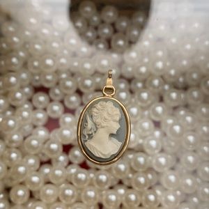 Blue and white cameo charm